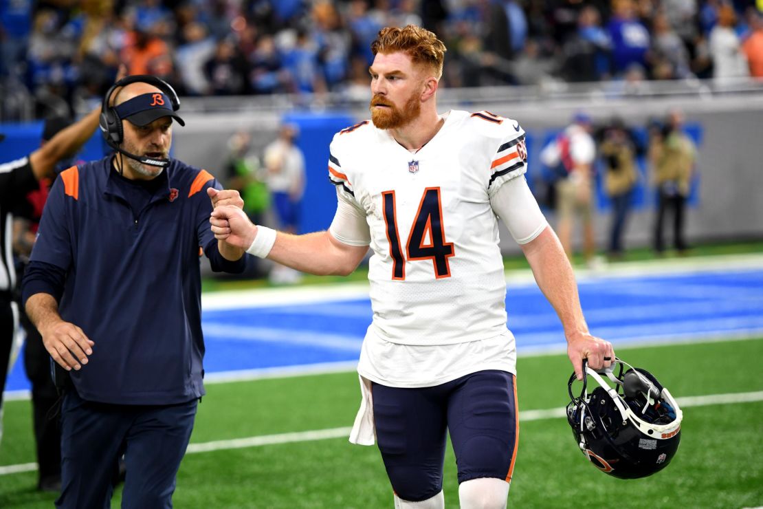 Matt Nagy and Andy Dalton fist bump during the second half against the Detroit Lions.
