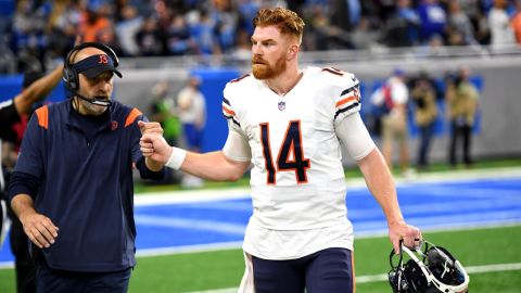 Matt Nagy and Andy Dalton fist bump during the second half against the Detroit Lions.