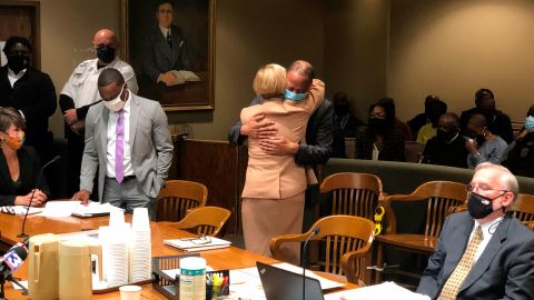 Pervis Payne, center, hugs his attorney, Kelley Henry, before a court hearing on Tuesday, November 23, 2021, in Memphis, Tennessee.