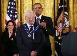U.S. President Barack Obama (R) presents the Presidential Medal of Freedom to theater composers and lyricists Stephen Sondheim (L)  during an East Room ceremony November 24, 2015 at the White House in Washington, DC. 