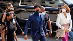 Actor Jussie Smollett, center, is charged with six counts of disorderly conduct on suspicion of making false reports to police. 