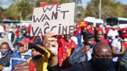 Hundreds of protesters rallied in South Africa's capital Pretoria on June 25, 2021 calling for the country's medicines regulatory body to give the green light to China's Sinovac and Russia's Sputnik vaccines, amid a third coronavirus wave.