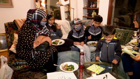 Asghary's family enjoys its first Thanksgiving meal.