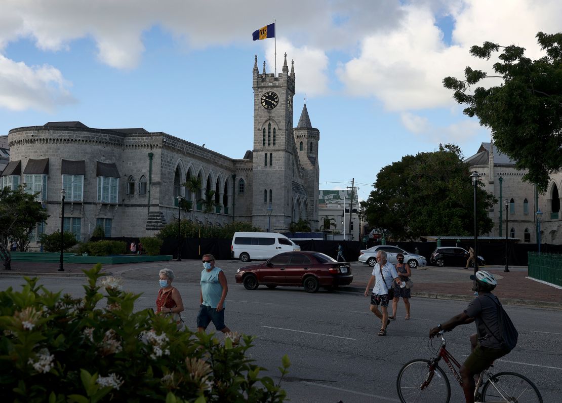 The Barbados flag flies above the parliament buildings on November 16 in Bridgetown, Barbados. 