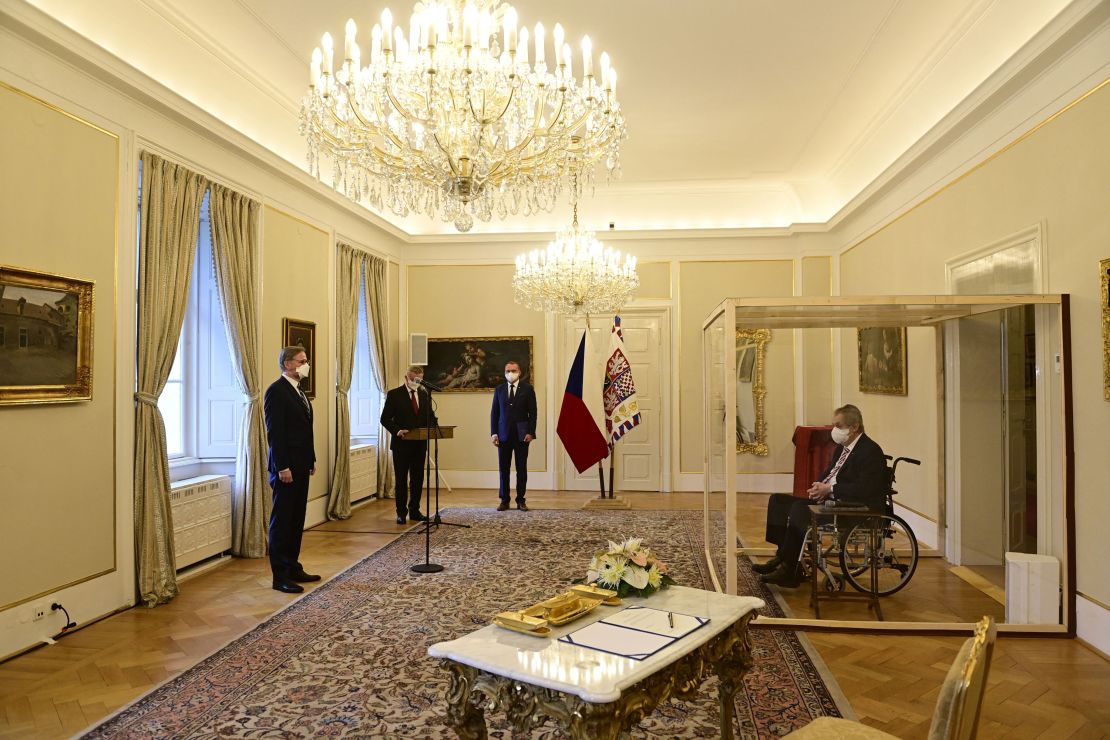 Czech President Milos Zeman formally appointed Petr Fiala as the country's new Prime Minister on Sunday while sat in an acrylic glass box after testing positive for the coronavirus earlier last week.