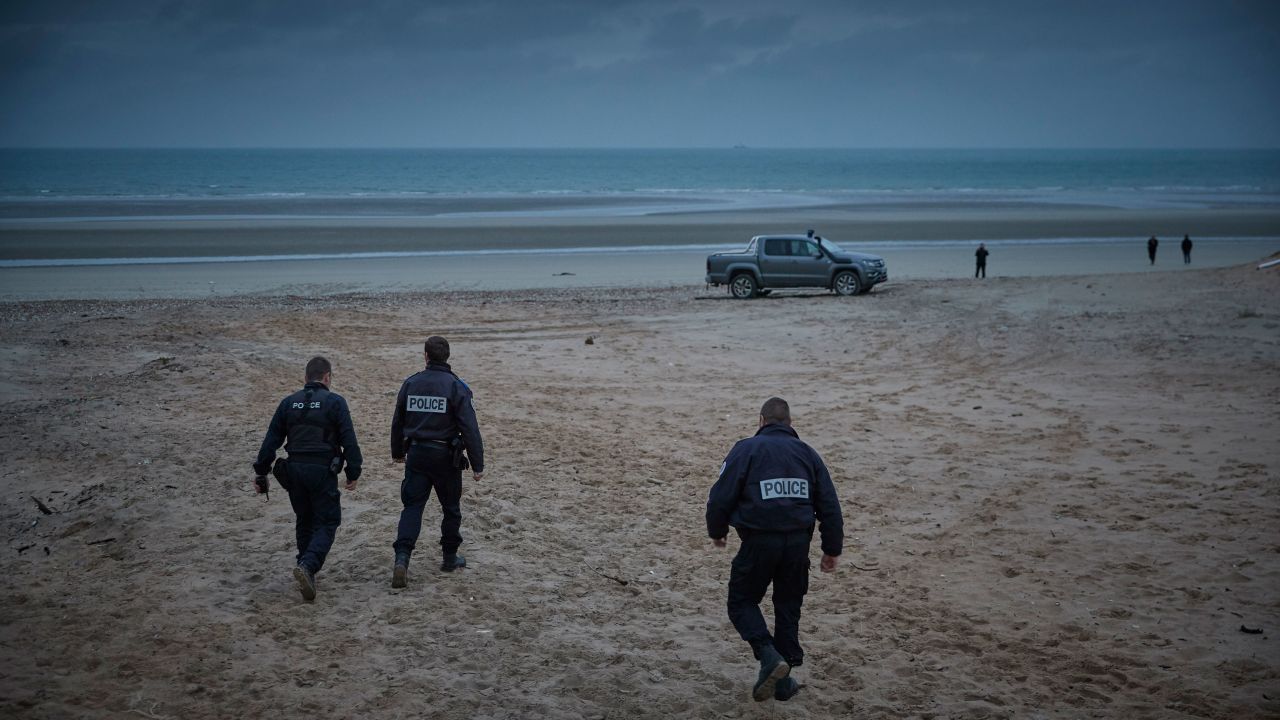 French police patrol the beach of Wimereux searching for migrants on November 25.