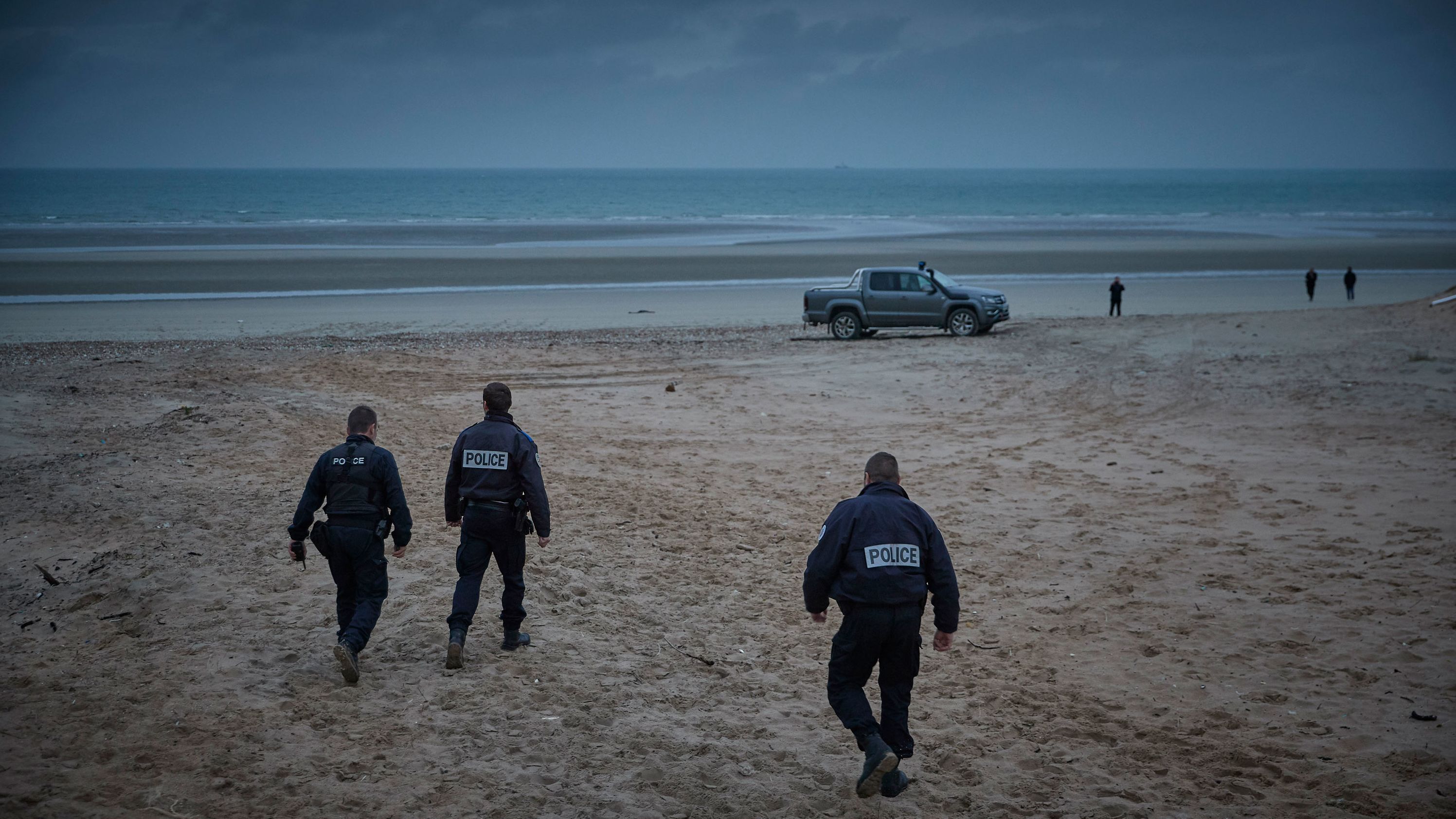 French police patrol the beach of Wimereux searching for migrants on November 25.