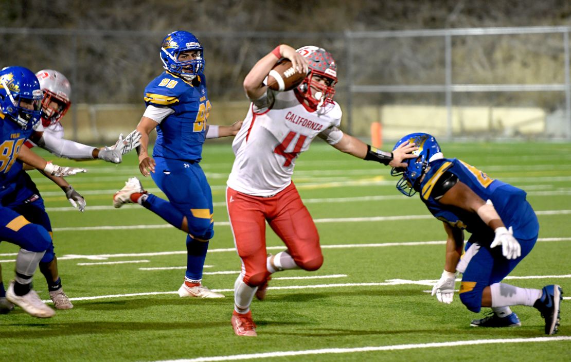 Trevin Adams of CSDR scores a touchdown against Avalon in the CIF Southern Section 8-man semifinal game in Avalon on Friday, November 19, 2021.