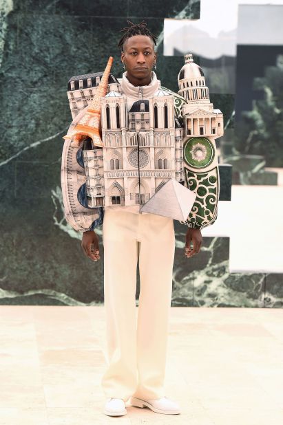 At one of his last fashion shows for Louis Vuitton, Abloh combined his love of architecture and fashion in a series of adventurous skyline puffer jackets. For his Fall-Winter 2021-22 collection, he paid homage to Paris where the show was held with a jacket covered in the city's landmarks including the Eiffel Tower, Notre Dame and Sacre Coeur cathedral among others.