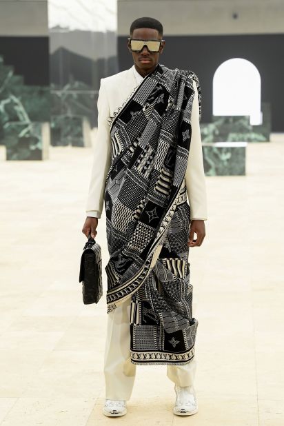 In Louis Vuitton's Fall-Winter 2021 collection, Abloh paid tribute to his Ghanaian heritage with this black and white Kente cloth design. The traditional garment, which is typically woven in bright colors, was given a monochrome makeover by Abloh and later worn by John Boyega at the 2021 Critics' Choice Awards where the actor won for Best Actor in a Limited Series.