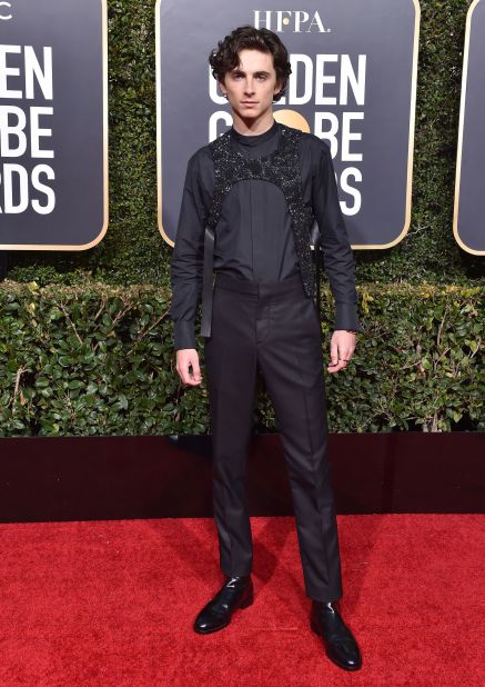 At the 2019 Golden Globes, Timothee Chalamet instantly went viral when he appeared on the red carpet wearing a black sparkling Louis Vuitton harness. 