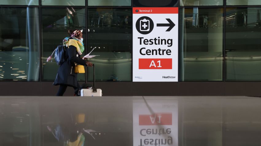 LONDON, ENGLAND - NOVEMBER 28: A covid testing centre sign at Heathrow Terminal 2 on November 28, 2021 in London, England. Following the discovery of a new Covid-19 variant, whose mutations  suggest greater transmissibility than previous virus strains, the United Kingdom imposed new restrictions on arriving travelers. From 04:00 today, people arriving from South Africa, Botswana, Lesostho, Eswatini, Zimbabwe and Namibi, Malawi, Mozambique, Zambia, and Angola will face mandatory hotel quarantine. From Tuesday, all international travelers must isolate until they return a negative PCR test, which must be taken by Day 2. (Photo by Hollie Adams/Getty Images)