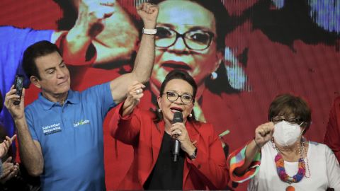 In this November 28, 2021, file photo, Xiomara Castro, center celebrates her win after the elections in Tegucigalpa, Honduras. 