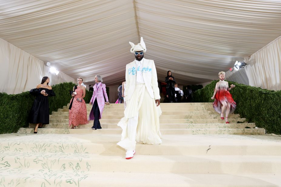 From his history-making work at Louis Vuitton as men's artistic director to unexpected partnerships with Mercedes Benz and artist Takashi Murakami, here's a look back at some of Virgil Abloh's best designs and collaborations. (Pictured: Abloh at the 2021 Met Gala "Celebrating In America: A Lexicon Of Fashion" at Metropolitan Museum of Art on September 13, 2021. 