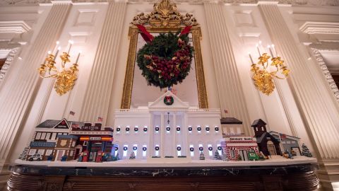 A ginger bread White House is seen in the State Dining room.