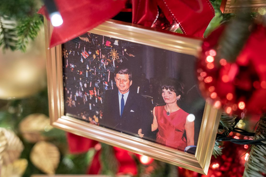 A photo of former United States President John F. Kennedy and First Lady Jaqueline Kennedy is displayed on a Christmas tree in the state Dining Room of the White House.