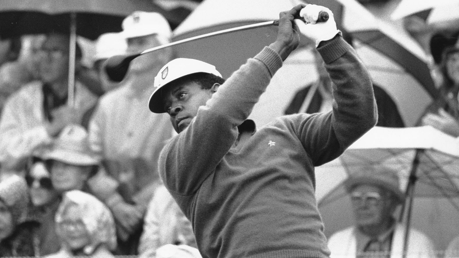 Lee Elder watches the flight of his ball as he tees off at the Masters in 1975. Elder <a href="index.php?page=&url=https%3A%2F%2Fwww.cnn.com%2F2015%2F04%2F08%2Fgolf%2Fgolf-masters-lee-elder%2Findex.html" target="_blank">told CNN in 2015</a> that making his Masters debut was a "very nerve-racking" experience. "I was shaking so badly, I did not know if I was even going to be able to tee up the ball," he said.