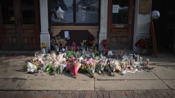 A memorial to those killed in Sunday Morning's mass shooting sits along the sidewalk in the Oregon District on August 06, 2019 in Dayton, Ohio.  Nine people were killed and another 27 injured when a gunman identified as 24-year-old Connor Betts opened fire with a AR-15 style rifle in the popular entertainment district. Betts was subsequently shot and killed by police. The shooting happened less than 24 hours after a gunman in Texas opened fire at a shopping mall killing 22 people.  