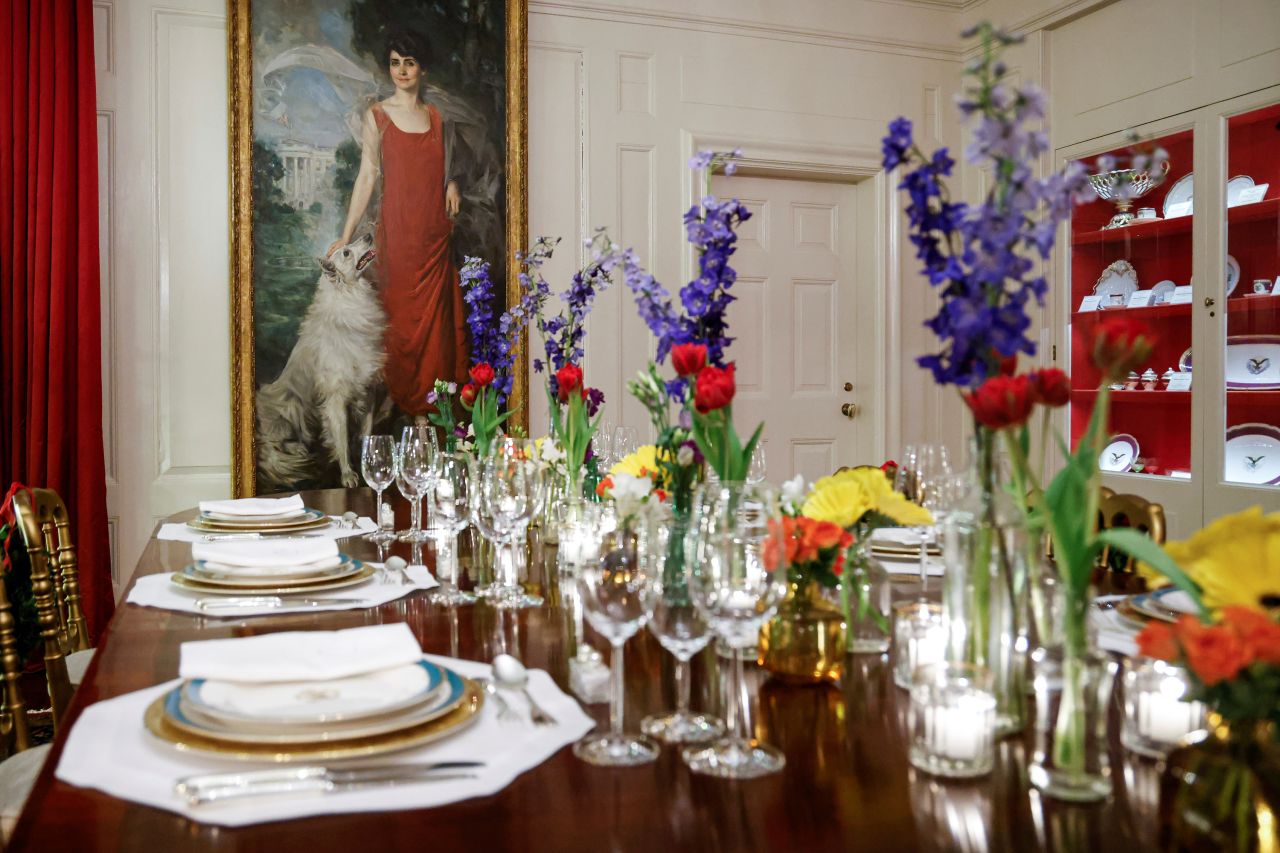 A portrait of former first lady Grace Coolidge overlooks a table set in the China Room.