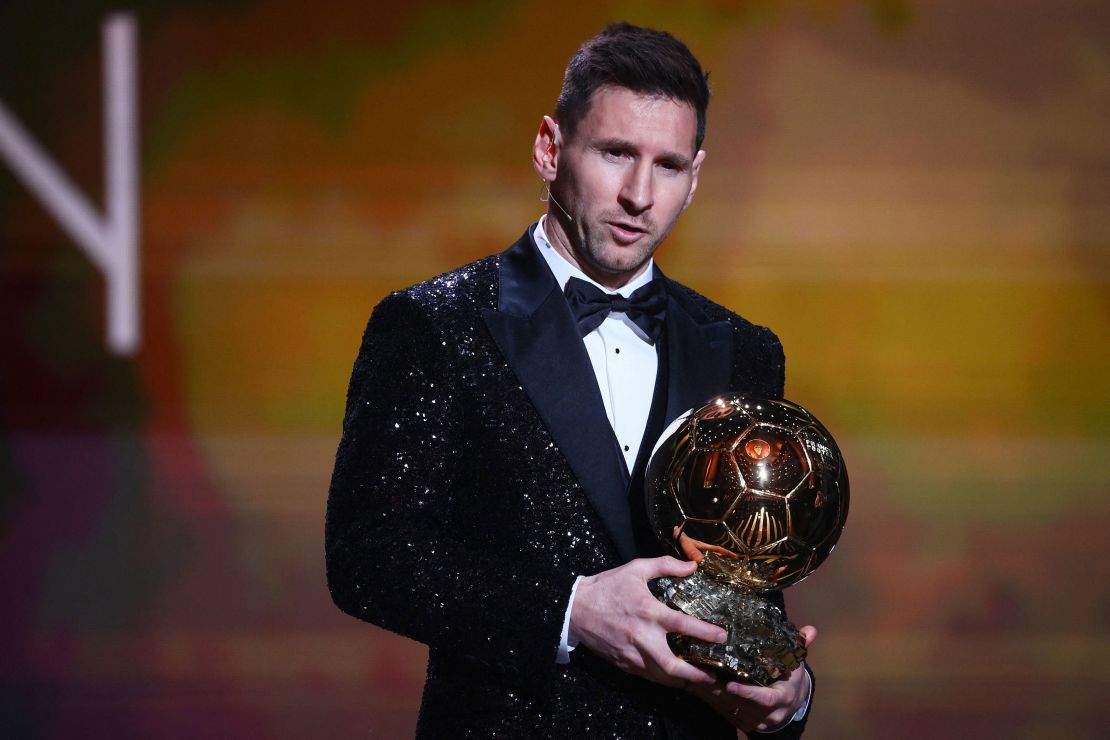 Messi poses after being awarded the the Ballon d'Or.