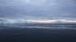 Rain falls in the distance in Disko Bay on September 4, 2021 in Ilulissat, Greenland. 2021 will mark one of the biggest ice melt years for Greenland in recorded history. In July, researchers estimated enough ice melted on the Greenland Ice Sheet to cover the entire state of Florida with two inches of water. 