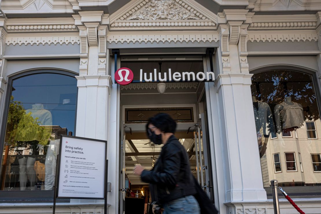 A pedestrian wearing a protective mask walks past a Lululemon store in San Francisco, California, U.S., on Monday, March 29, 2021. Lululemon Athletica Inc. is expected to release earnings figures on March 30. Photographer: David Paul Morris/Bloomberg via Getty Images