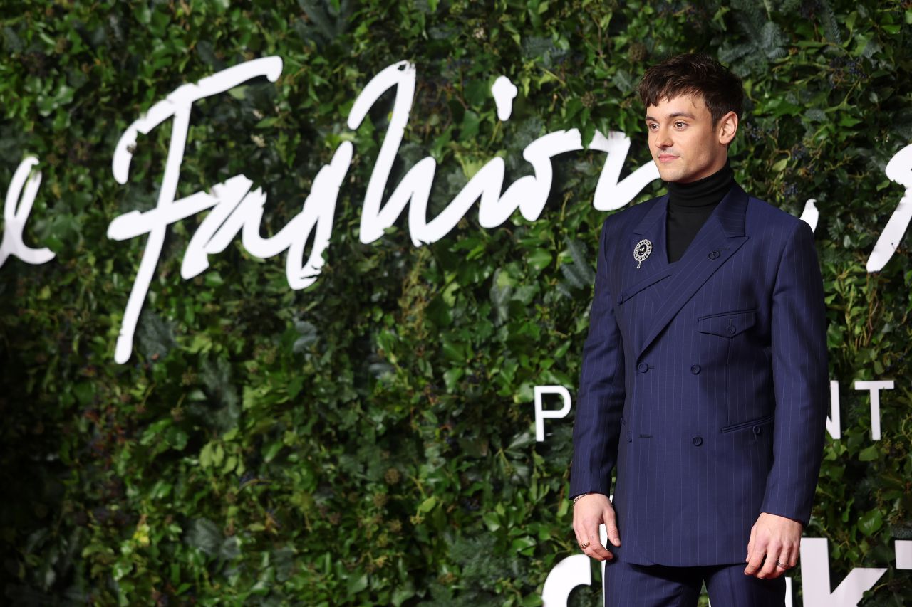 British Olympic diver Tom Daley poses on the red carpet upon arrival.