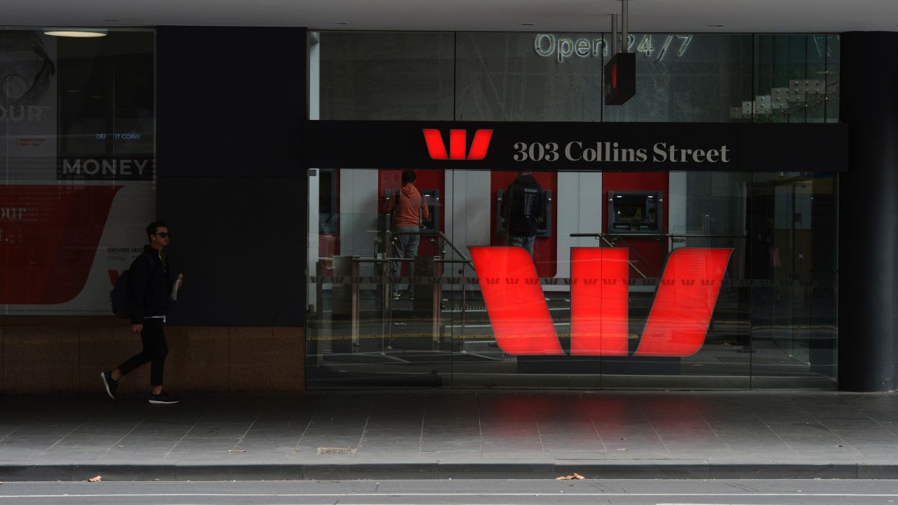 A pedestrian walking past a Westpac branch in Melbourne, Australia in 2019.
