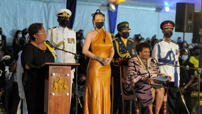 Barbados's Prime Minister Mia Mottley (L) asks the country's new President Sandra Mason (seated R) to make Barbadian singer Rihanna (C) the country's 11th National Hero during a ceremony to declare Barbados a republic and the inauguration of the country's first president, at Heroes Square in Bridgetown on November 30, 2021.