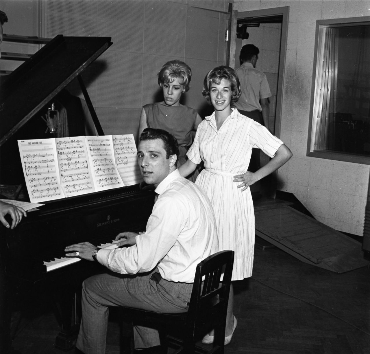 Musicians<a href="http://www.mann-weil.com/" target="_blank" target="_blank"> Barry Mann, Cynthia Weil</a> and King at JDS Records in 1959. Mann and Weil were a husband and wife songwriting team. They were part of the teen writing staff at Aldon Music, which included King and Goffin. Mann and Weil produced "Uptown," "Here You Come Again," and "You've Lost That Lovin' Feeling."