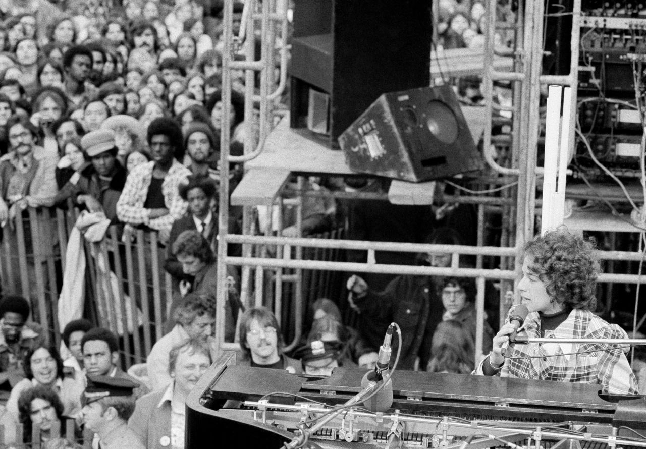 King performs a free concert in New York City's Central Park to an audience of nearly 100,000 in 1973. King, who was born in New York City, said the city had given her a great deal and she wanted to give something back.