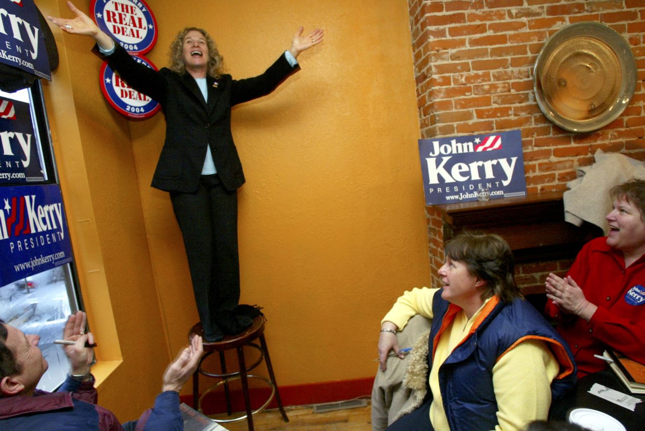 King sings, "I Feel the Earth Move," during a rally for Democratic presidential hopeful Sen. John Kerry in 2004 in Dubuque, Iowa. 