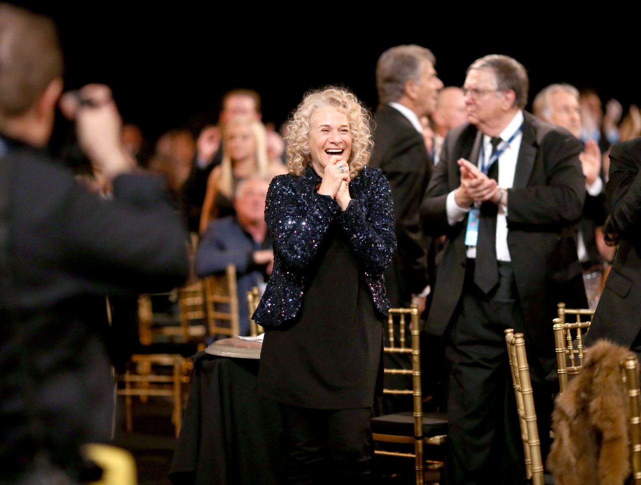 King is honored as the 2014 MusiCares Person Of The Year at the Los Angeles Convention Center. "Her contributions as a songwriter and performer have truly changed the landscape of pop music, and her philanthropy speaks volumes about her generosity and personal passions," said Neil Portnow, president and CEO of the <a href="https://www.musicares.org/musicares/news/carole-king-named-2014-musicares-person-of-the-year" target="_blank" target="_blank">MusiCares Foundation. </a>