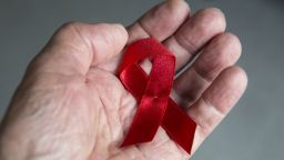 The Red Ribbon is a worldwide symbol of solidarity for people living with HIV and AIDS. 