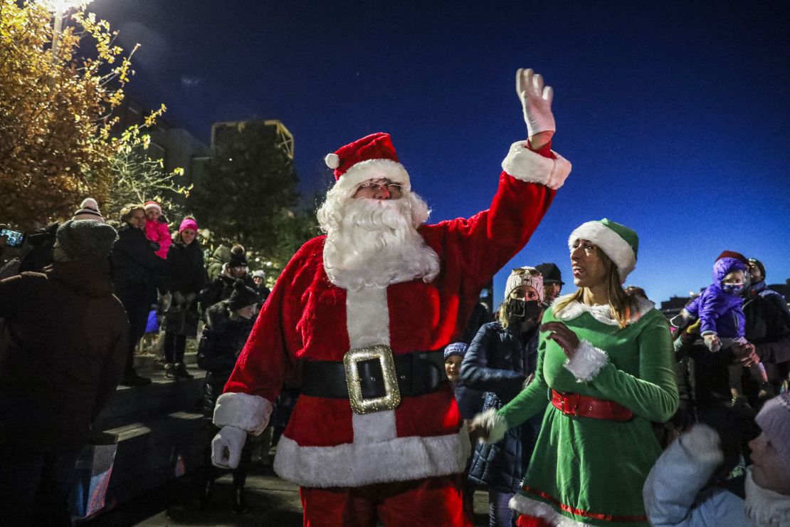Santa Claus arrives at a holiday event at HarborWalk in Boston on November 21, 2021.  Some companies are already booking Santas for next year's holiday season. 