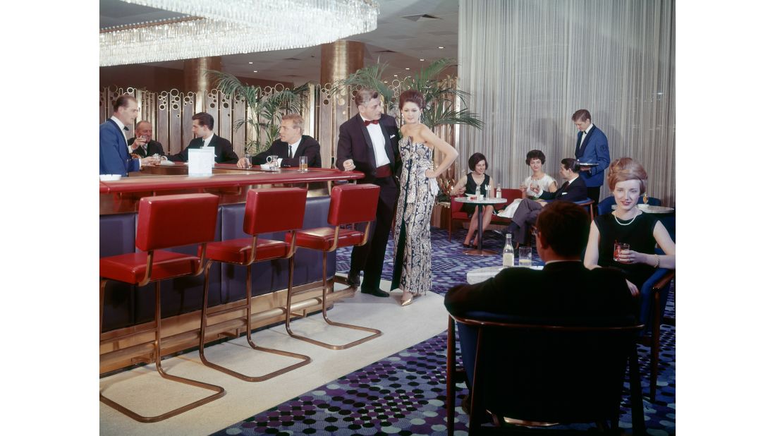 <strong>Setting the scene: </strong>The deZangers would make a list of every scene they wanted to capture at each hotel, and then Wilma would source models. Often Pan Am flight attendants and pilots would step in, she says, as well as hotel employees. Here's the restaurant at the InterContinental Wien Hotel in Vienna, Austria, which opened in 1964 and is still operating today.