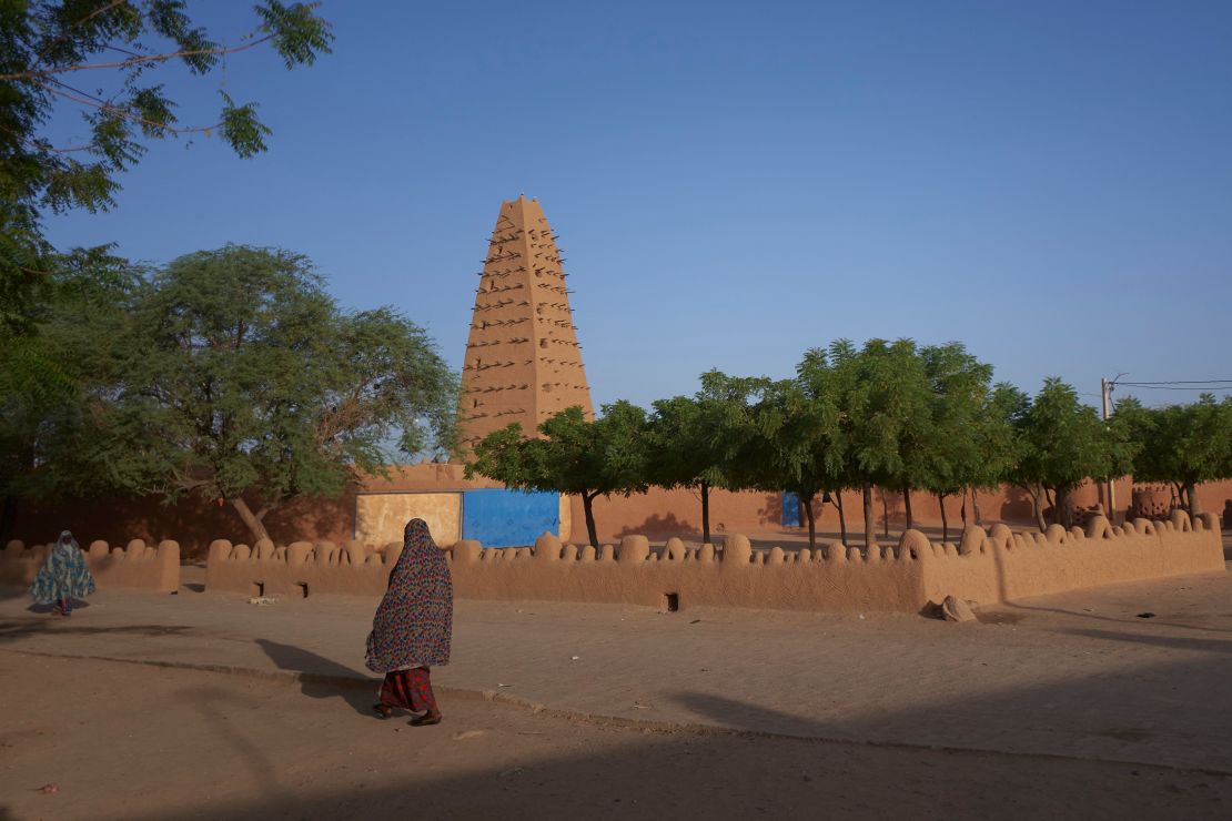 A woman is seen walking in the old city of Agadez, Niger, on September 15.