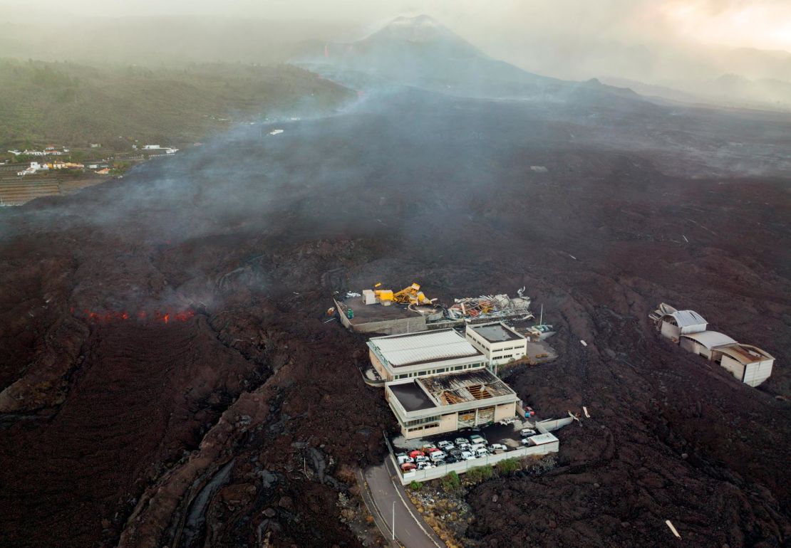 Fast flowing lava moves through parts of Spain's La Palma island on Monday, months after it first erupted.