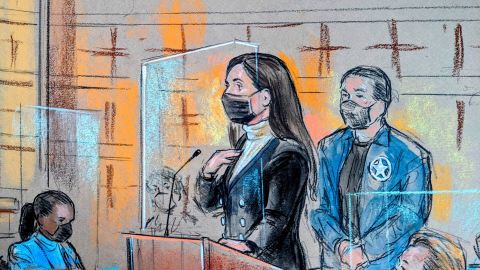 Emma Coronel Aispuro stands before a federal judge as she is sentenced to three years in prison.