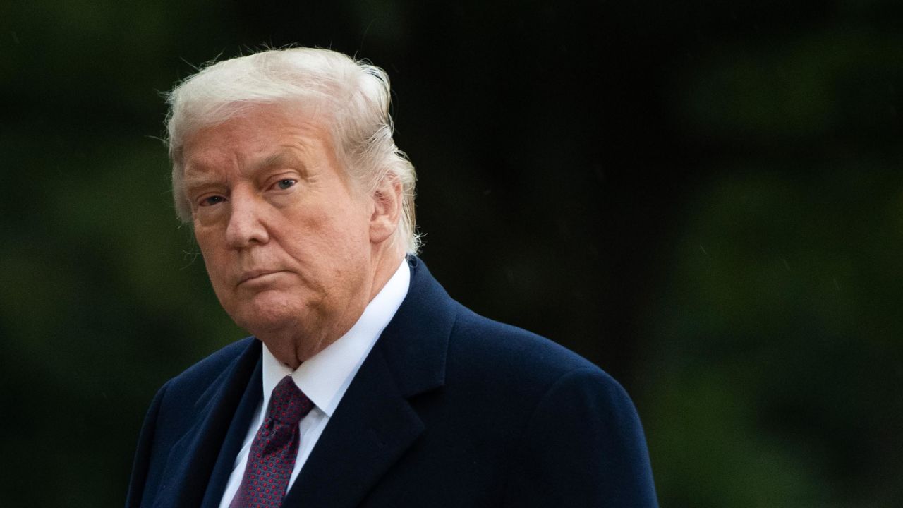 Then-President Donald Trump walks from Marine One after arriving on the South Lawn of the White House in Washington, DC, October 1, 2020, following campaign events in New Jersey.