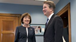 Brett Kavanaugh, then-Supreme Court associate justice nominee for U.S. President Donald Trump, right, and Senator Susan Collins, a Republican from Maine, smile during a meeting on Capitol Hill in Washington, D.C., U.S., on Tuesday, Aug. 21, 2018. Collins planned to ask Kavanaugh about abortion and said she intended to talk about his praise for the then-Justice William Rehnquist's dissent in Roe v. Wade, the landmark 1973 abortion-rights case.