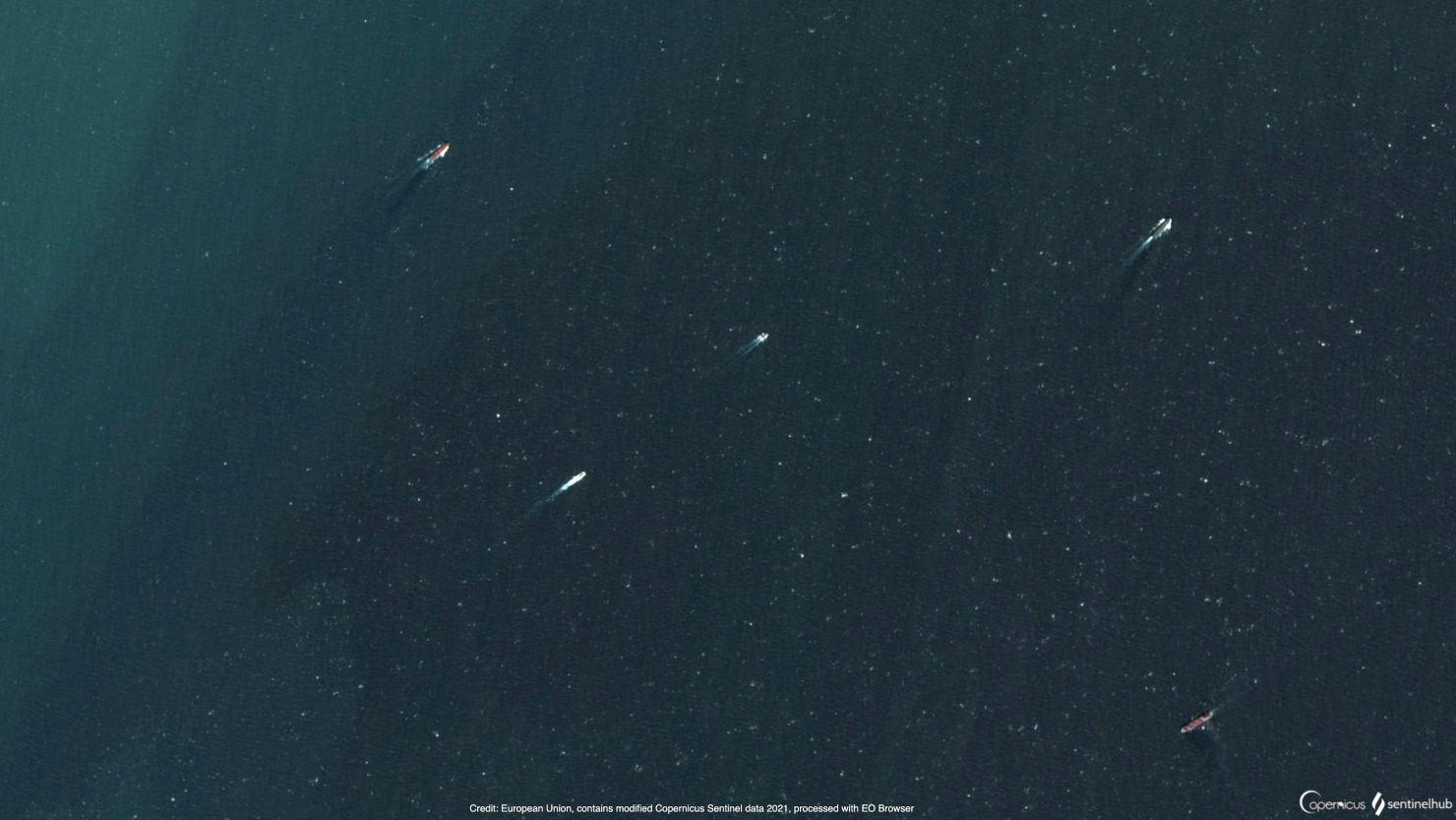 An image from European satellite imaging company Sentinel 2 shows what analyst HI Sutton says is a Chinese submarine in the lower left.
