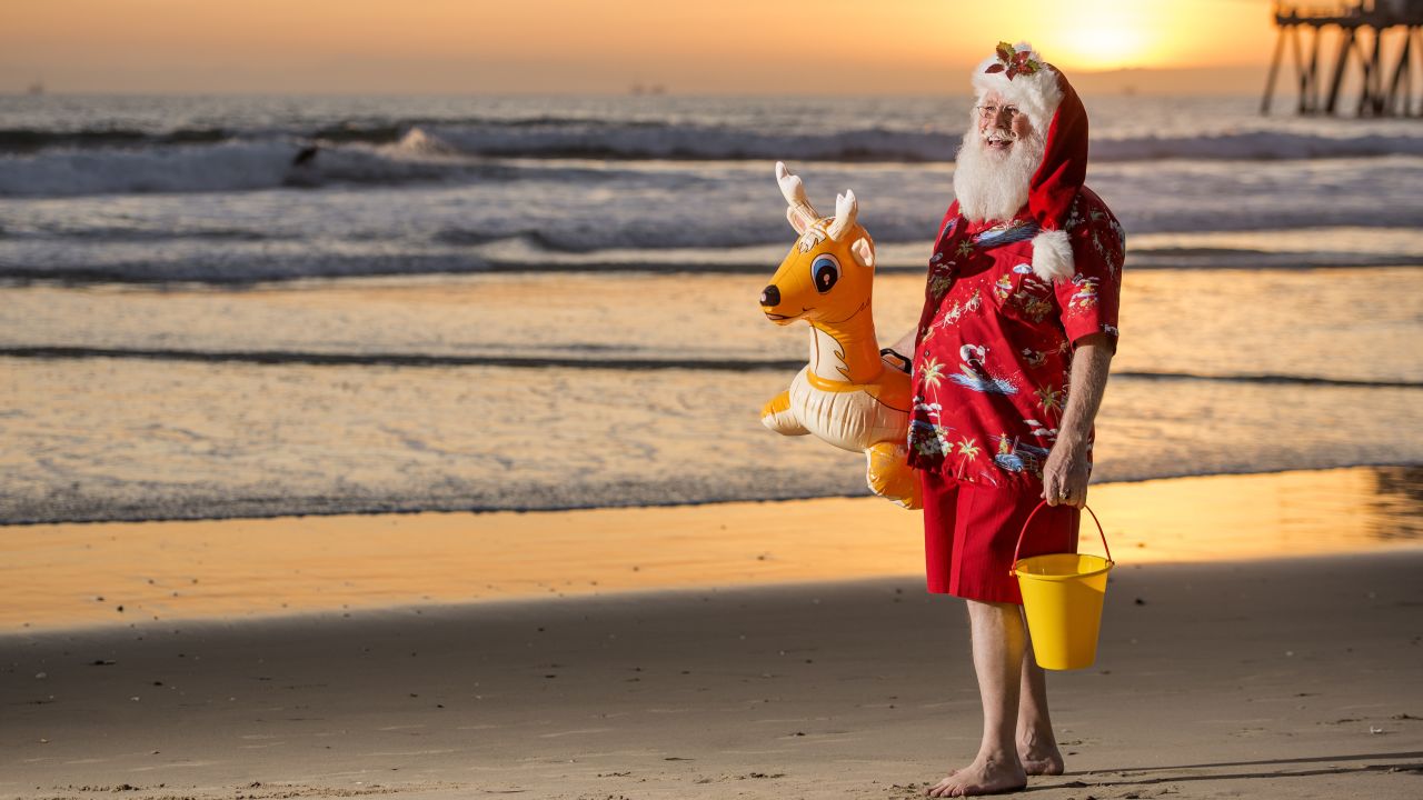 Tim Connaghan has been working as a Santa for more than 50 years. He says his booking agency requires Santas to have proof of vaccination against Covid-19.