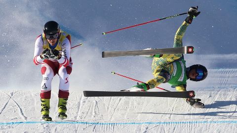 Germany's Tobias Mueller falls while racing Austria's Johannes Aujesky during a World Cup ski cross event in Zhangjiakou, China, on Saturday, November 27.