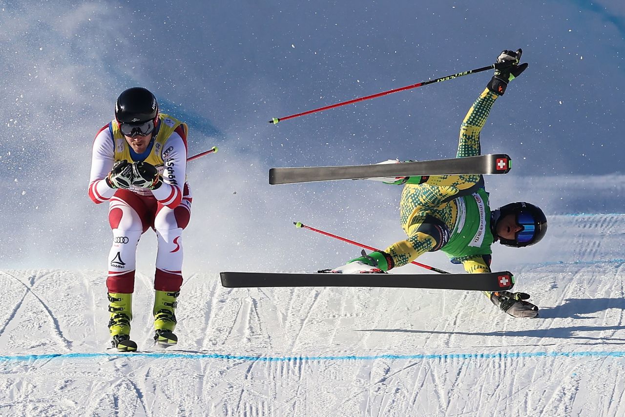 Germany's Tobias Mueller falls while racing Austria's Johannes Aujesky during a World Cup ski cross event in Zhangjiakou, China, on Saturday, November 27.