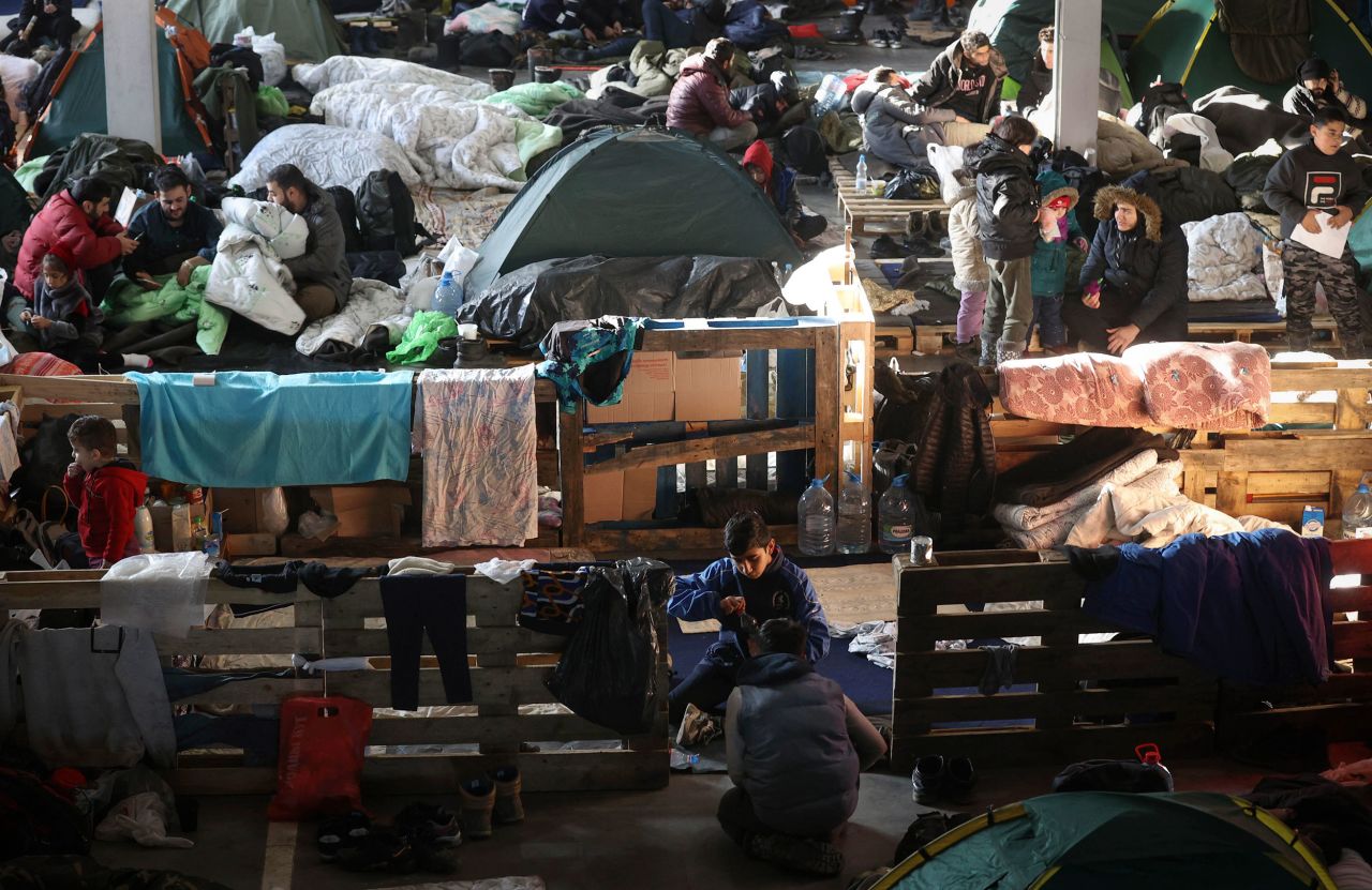 Migrants camp inside the processing center of Belarus' Bruzgi checkpoint, at the Polish border near the city of Grodno, on Wednesday, December 1. Migrants have been stranded at the border between Poland and Belarus for months, <a href="https://www.cnn.com/2021/11/11/europe/belarus-poland-crisis-explainer-cmd-intl/index.html" target="_blank">trapped at the center of an intensifying geopolitical dispute.</a>