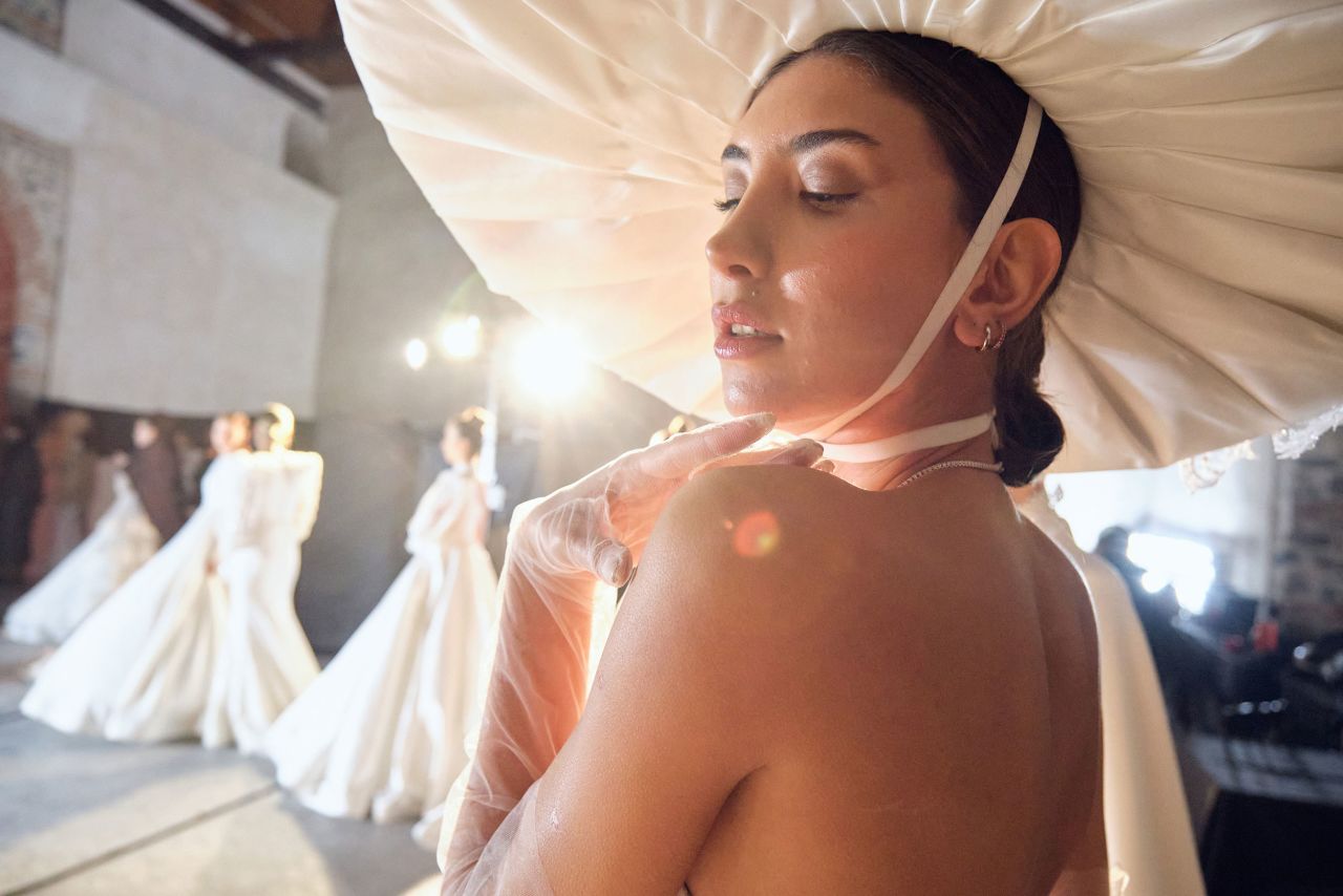 A model poses backstage at an Istanbul fashion show featuring the Hakan Akkaya x Cinderella Bridal Capsule Collection on Tuesday, November 30.