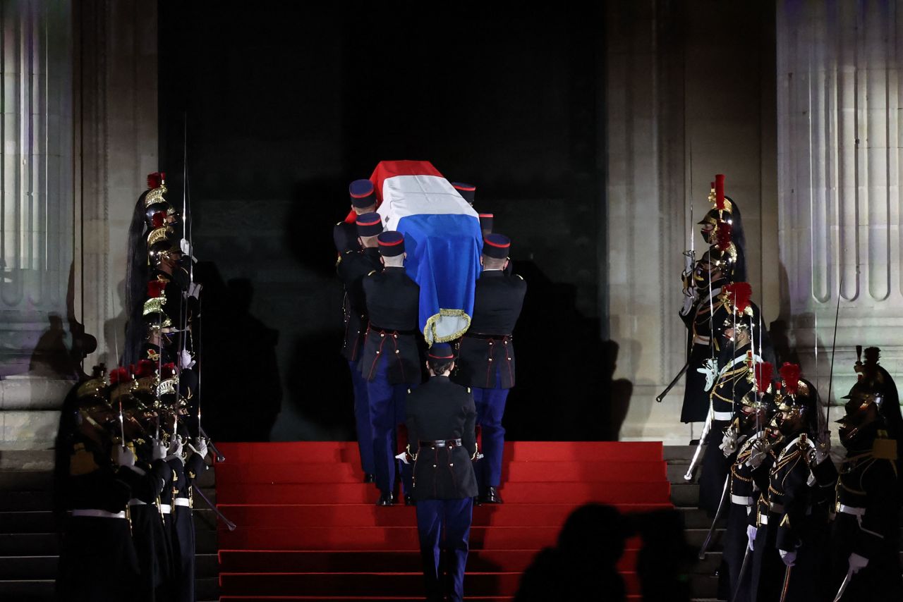 A coffin covered with the French flag is carried toward the Panthéon monument in Paris on Tuesday, November 30. Legendary entertainer Josephine Baker was becoming <a href="https://www.cnn.com/style/article/josephine-baker-pantheon-scli-intl/index.html" target="_blank">the first Black woman to receive a tomb at the Panthéon,</a> which honors the country's greatest heroes. Although she was born American, Baker was the embodiment of the French spirit, the Élysée Palace wrote in a statement. She received French citizenship in 1937. Her coffin at the Panthéon doesn't contain her remains — those are still buried in Monaco — but it does have handfuls of dirt from four important locations in her life.