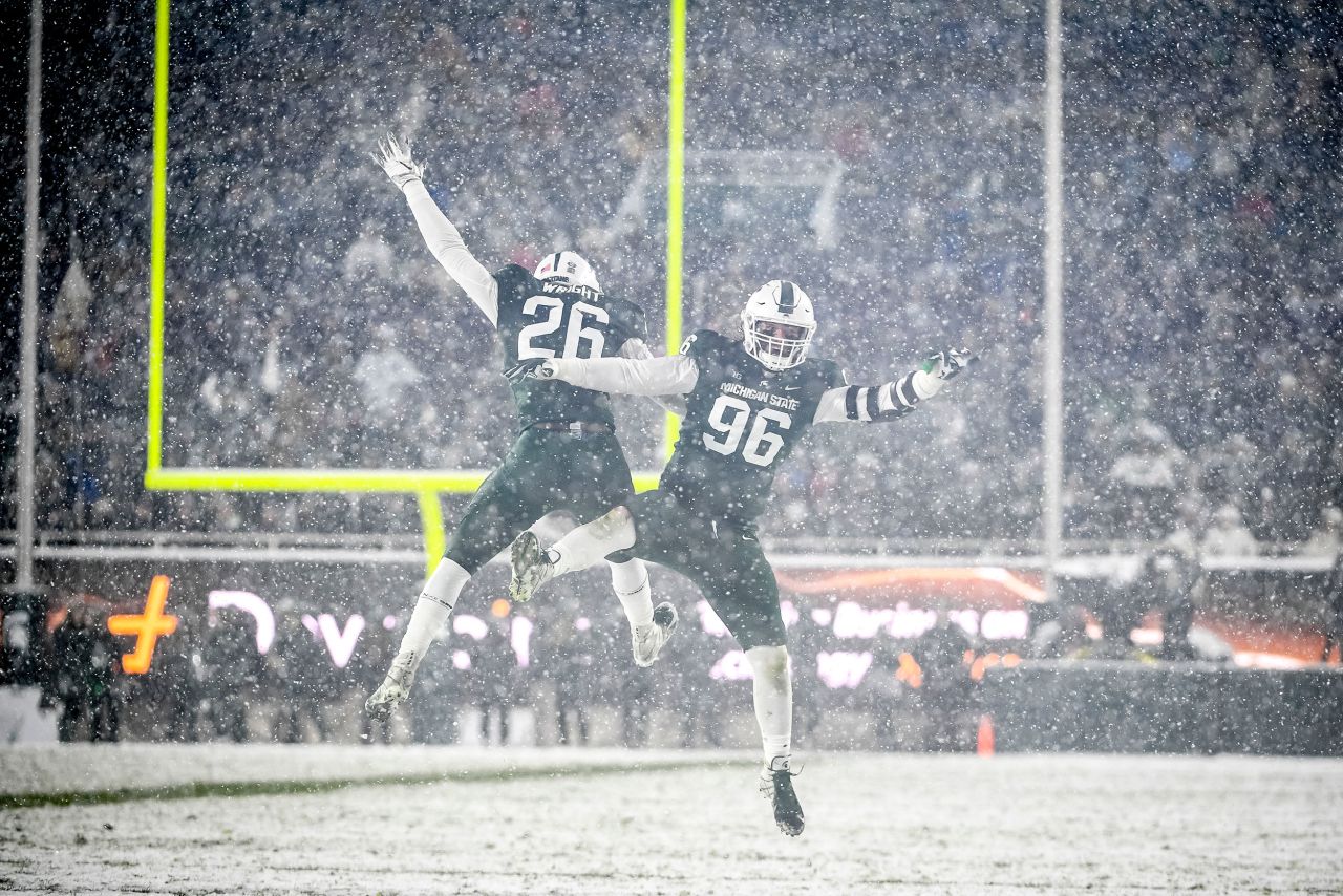 Michigan State's Brandon Wright, left, and Jacub Panasiuk celebrate during the fourth quarter of their win versus Penn State on Saturday, November 27.