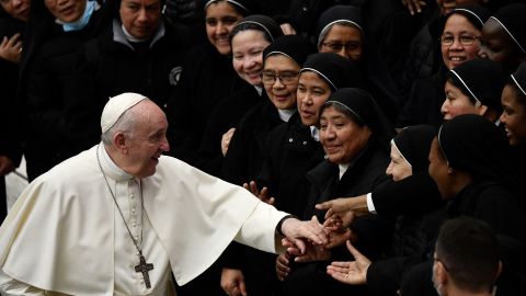 Pope Francis greets nuns visiting the Vatican on Wednesday, December 1.